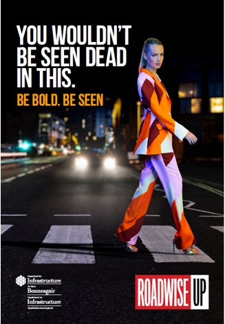 Image of a person crossing the road wearing colourful, clothes with the caption,'You wouldn't be seen dead in this'